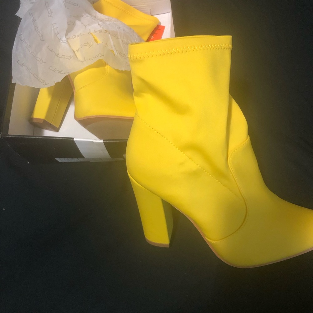 Bright Yellow Low heel boots.